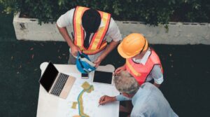 construction workers discussing commercial renovation timeline